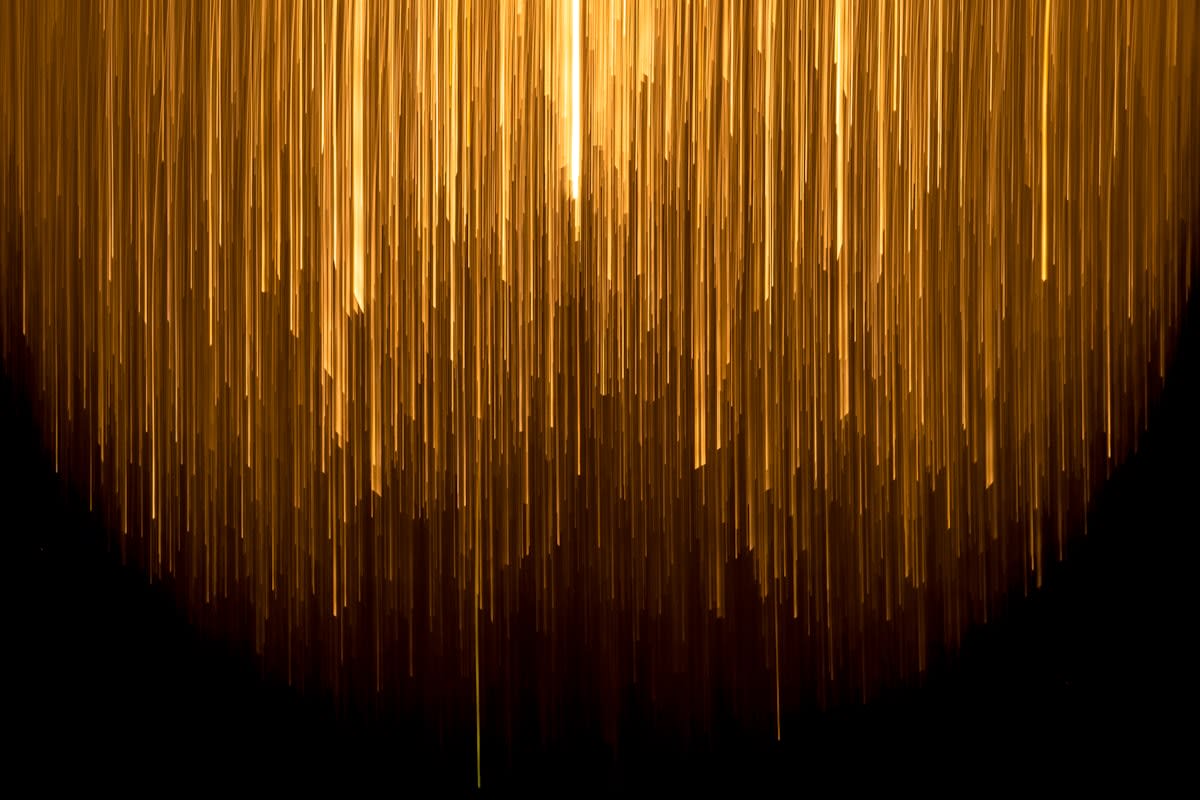 Abstract gold and digital data lines