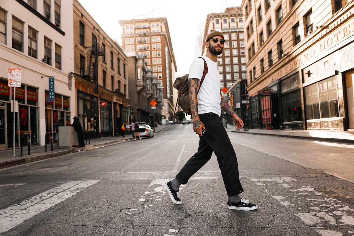person walking briskly in a city