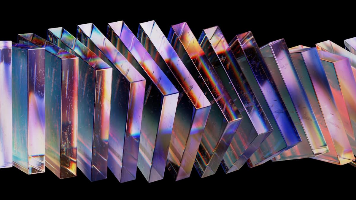 abstract representation of fragmented glass reflecting different worlds