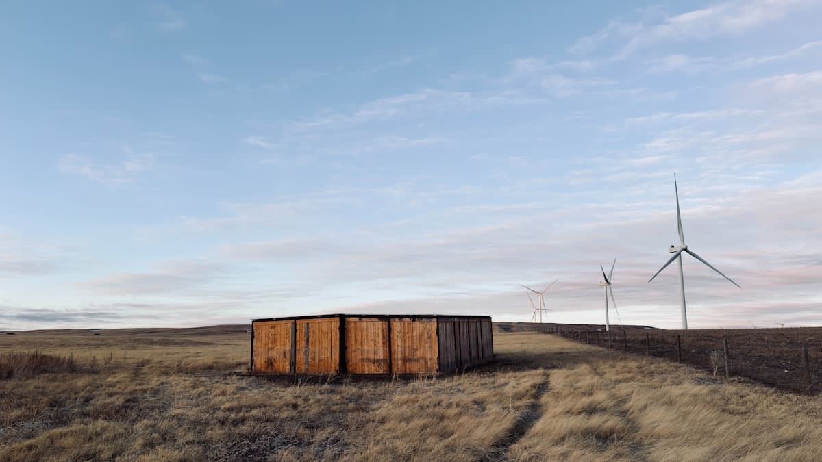 Large scale energy storage containers in a field