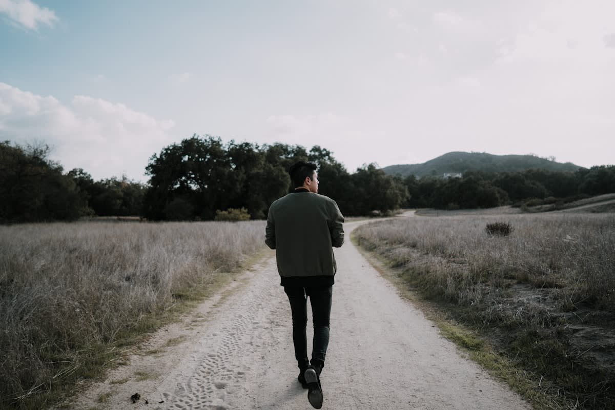 Person walking in a park