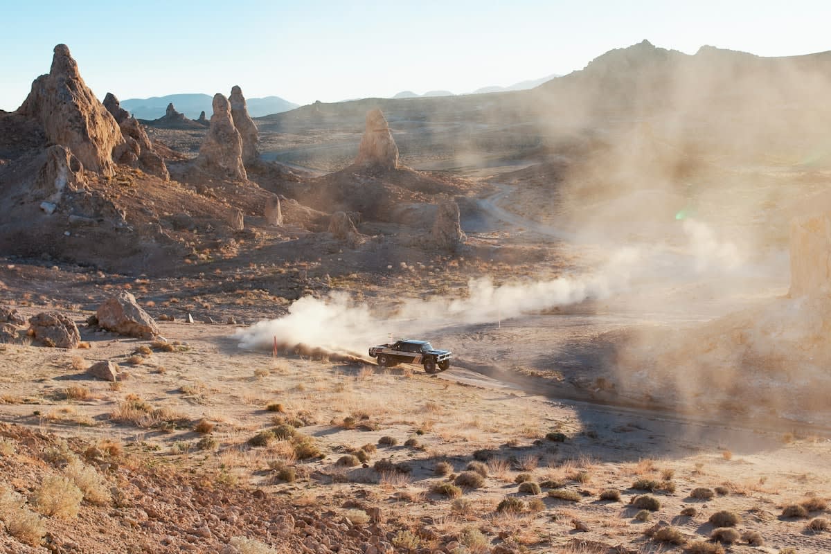 Deep geothermal drilling rig in a rugged landscape