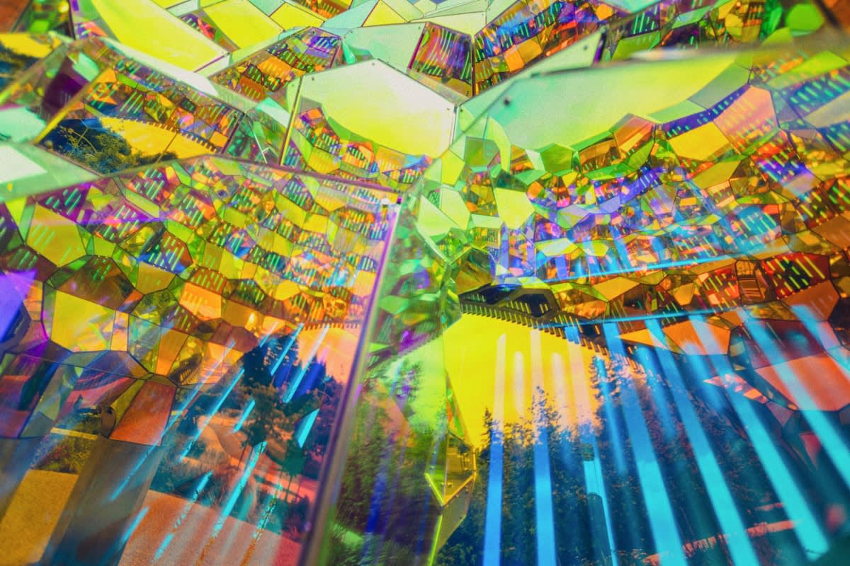 Abstract visualization of a shattered mirror reflecting different digital screens