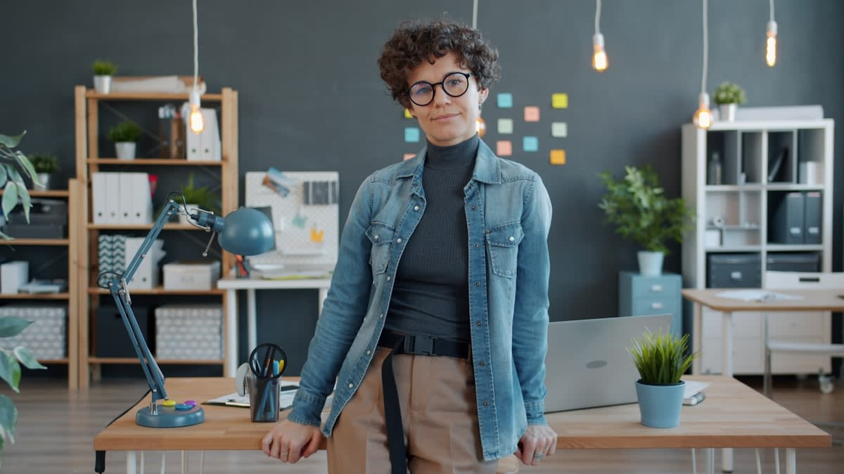 person meditating in a modern office setting
