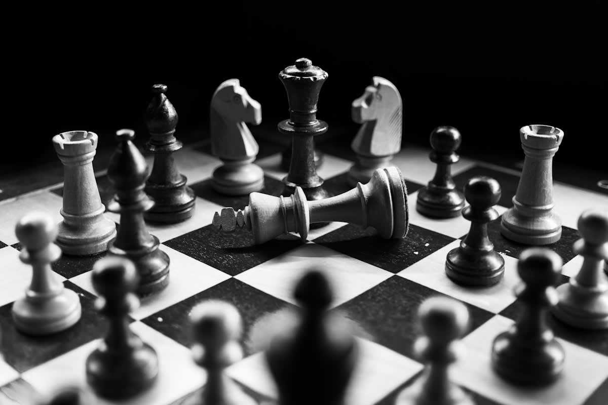 Strategic chess pieces on a board