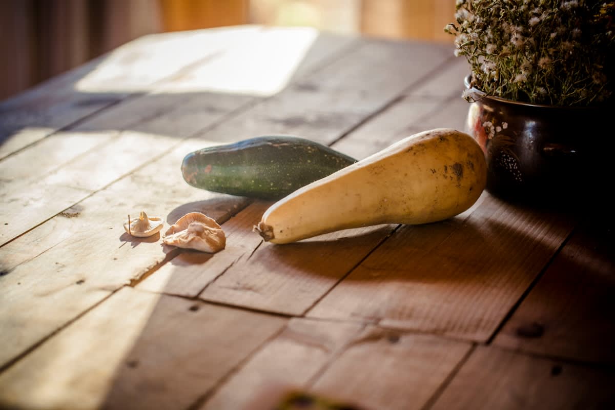 Diverse local produce on a rustic wooden table