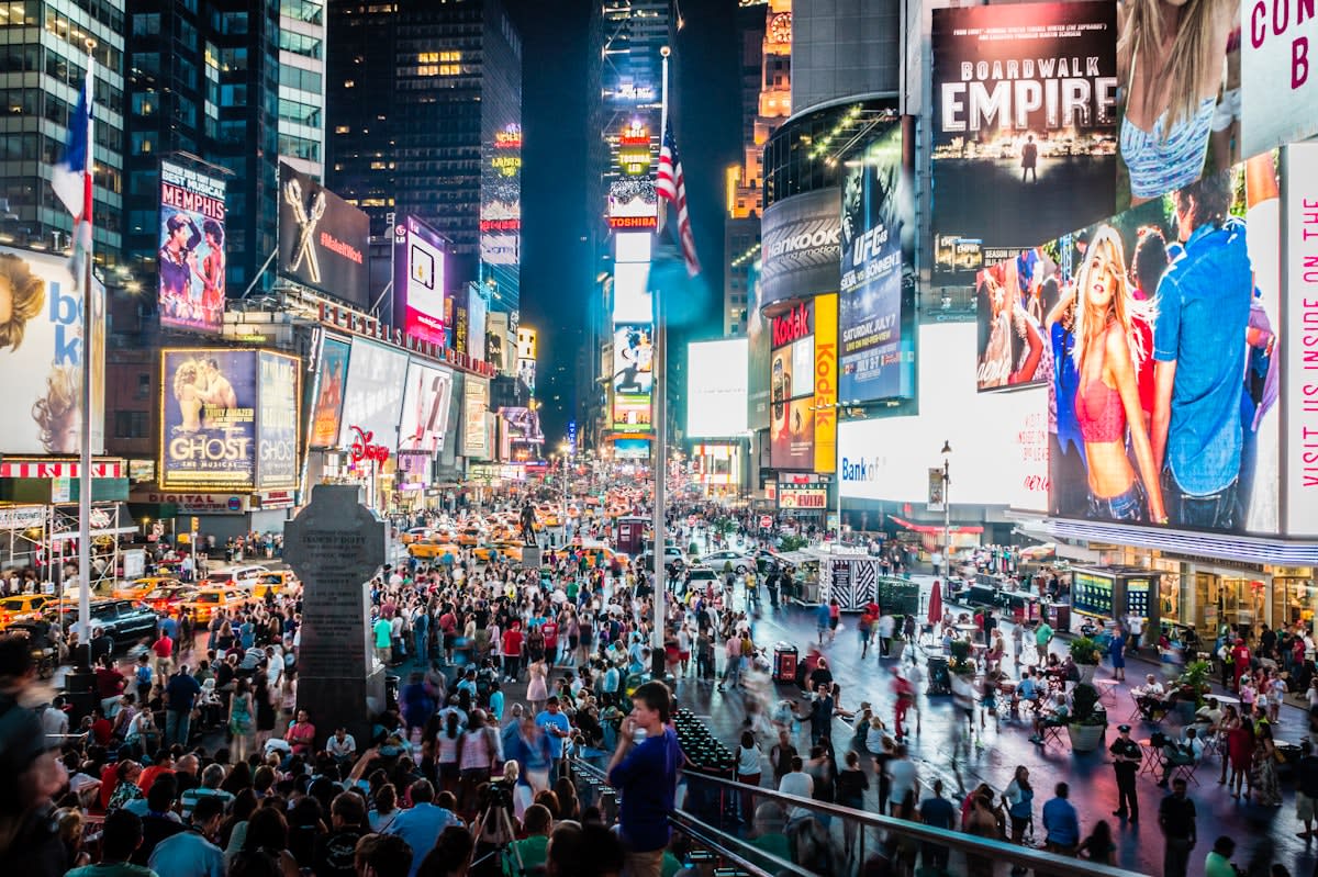 lonely person in a crowded city