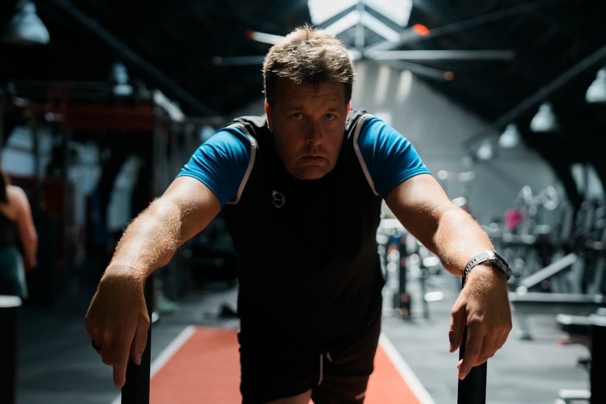 Athlete looking exhausted in a gym
