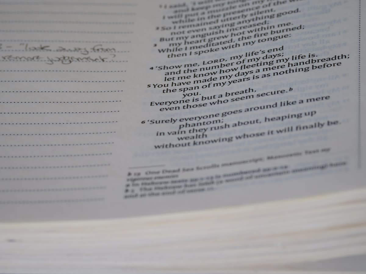 close up of a detailed daily planner with handwritten notes