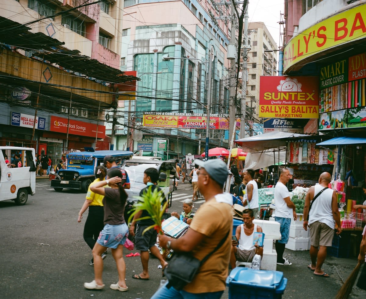 A bustling local coffee shop in a dense urban neighborhood
