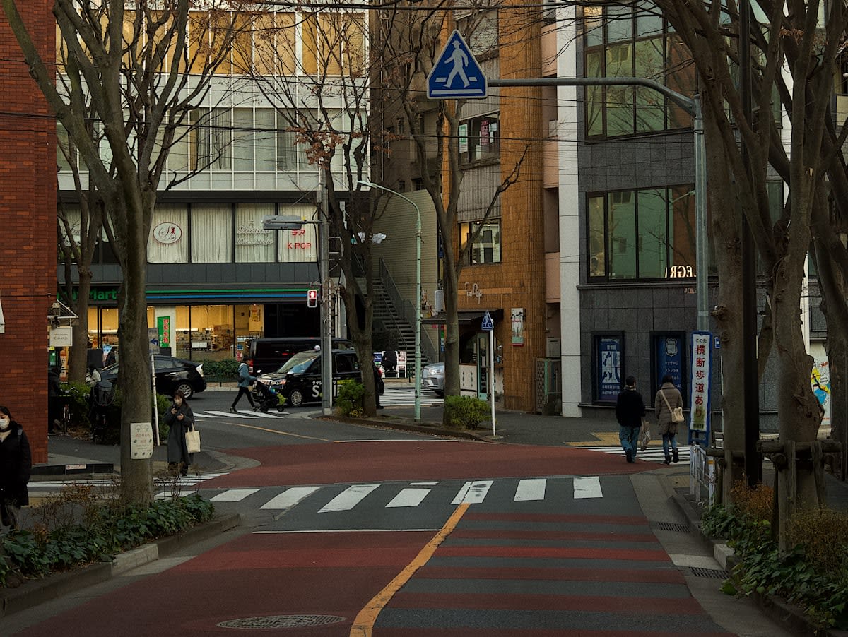 Close up of tactile paving and intuitive street signage in Tokyo