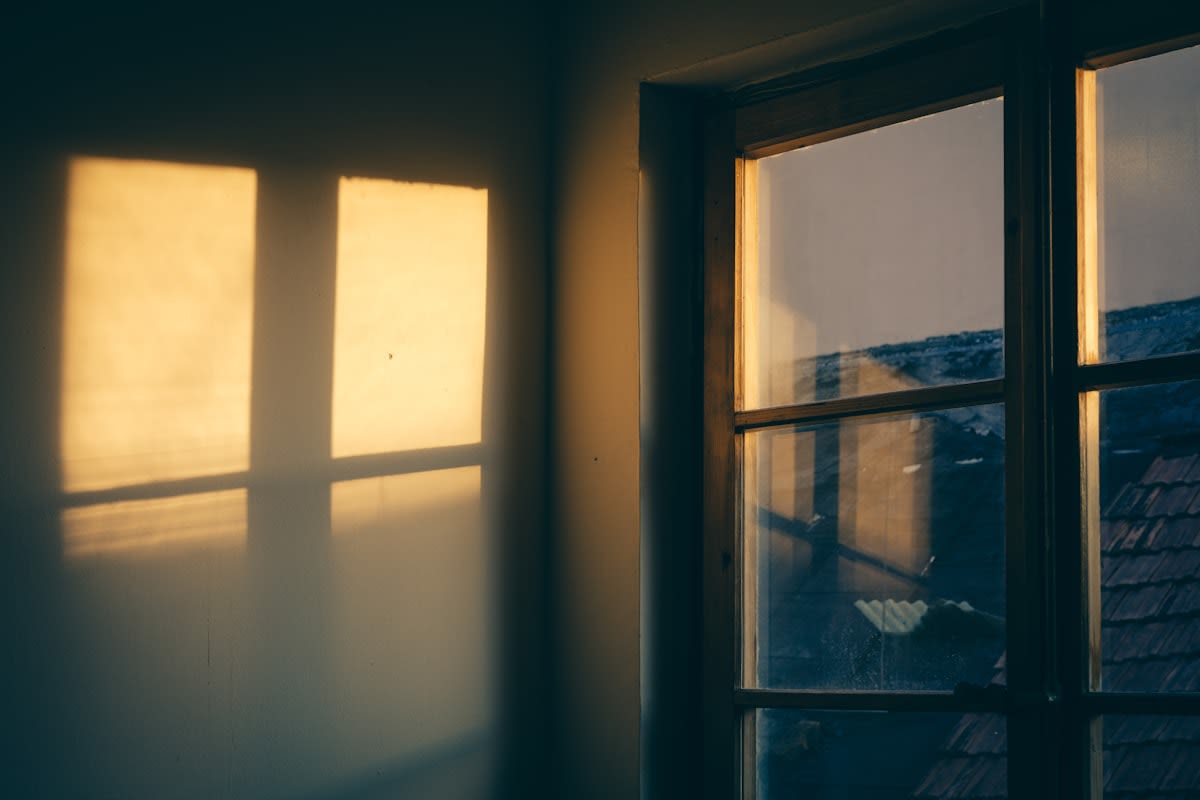 Bright morning sunlight streaming through a window