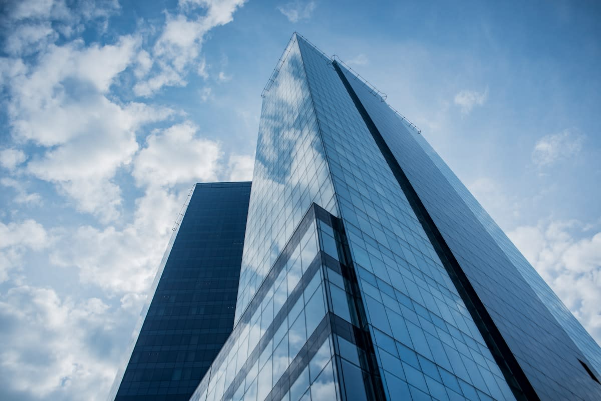 Modern glass skyscraper with reflective facade