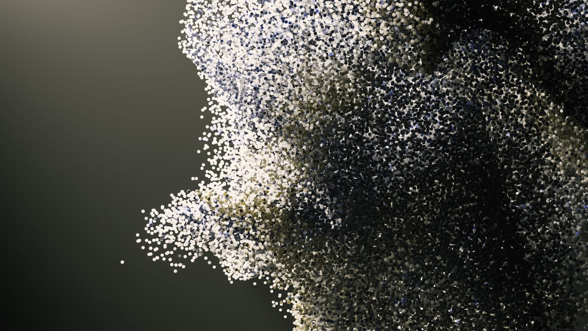 Conceptual art showing a human silhouette dissolving into digital pixels and data points
