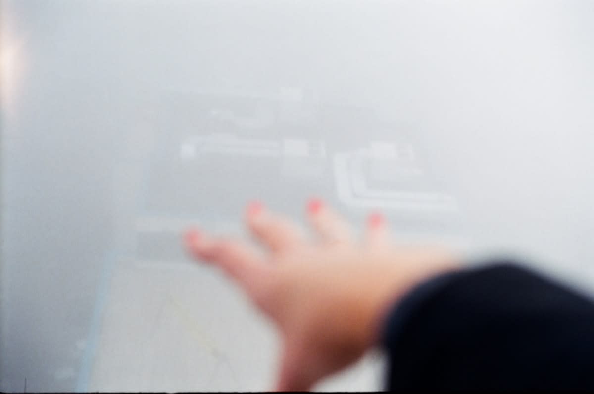 A human hand interacting with a digital holographic interface