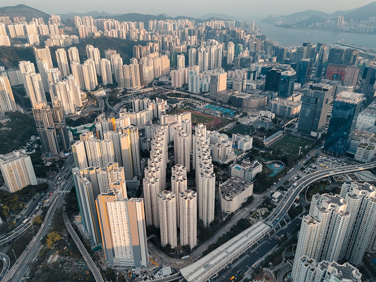 Aerial view of dense urban residential blocks in a global city