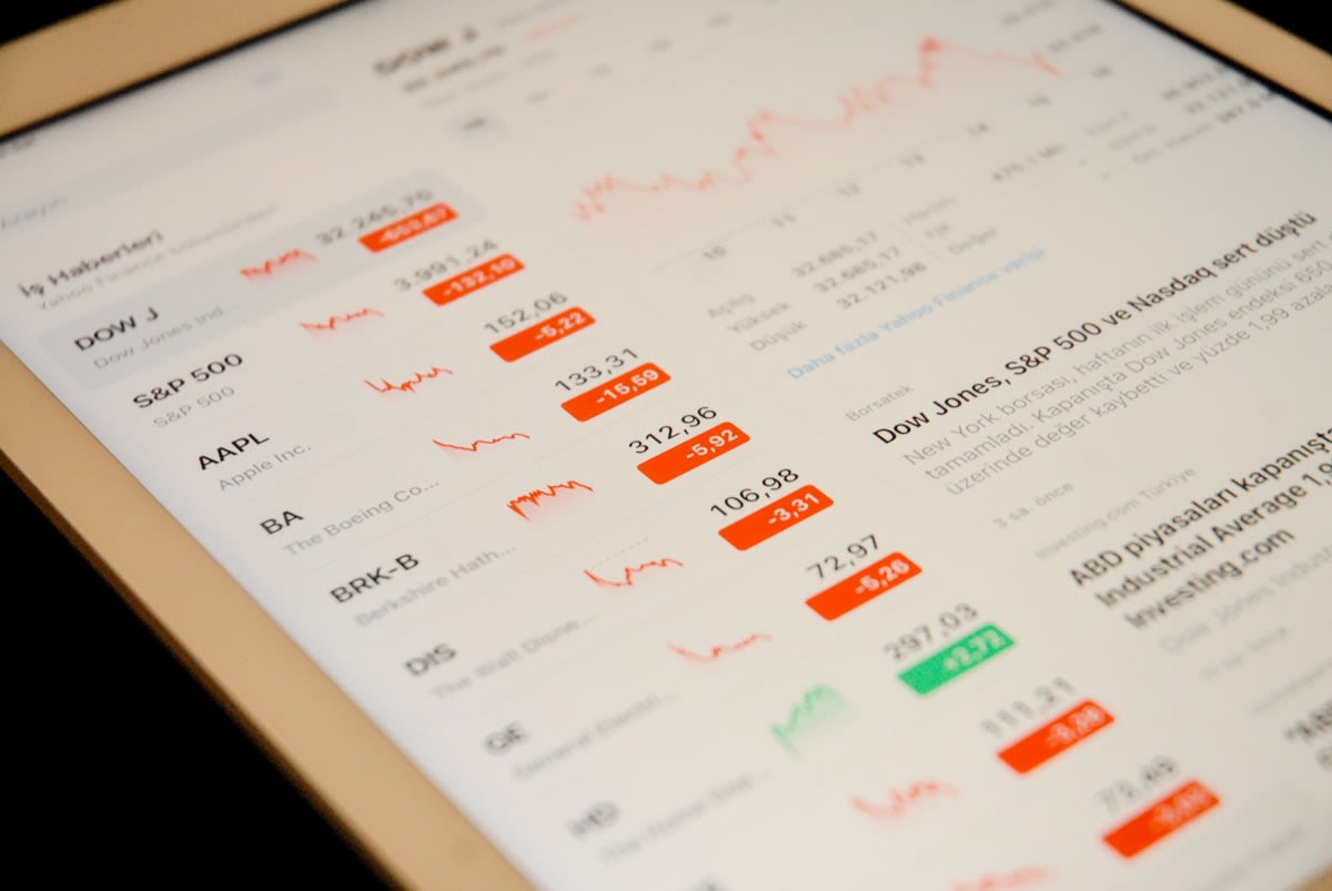 Close up of a digital tablet showing real estate portfolio analytics