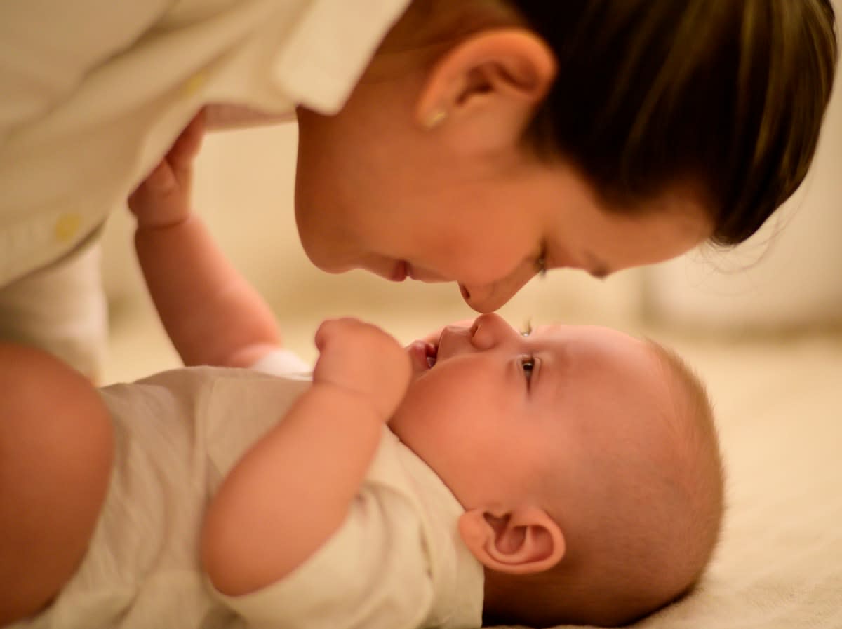 Caregiver and baby interacting