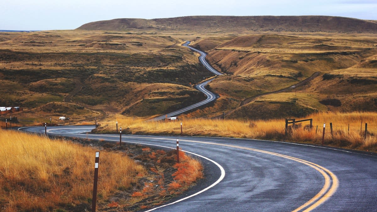 Serene landscape with a slow winding road