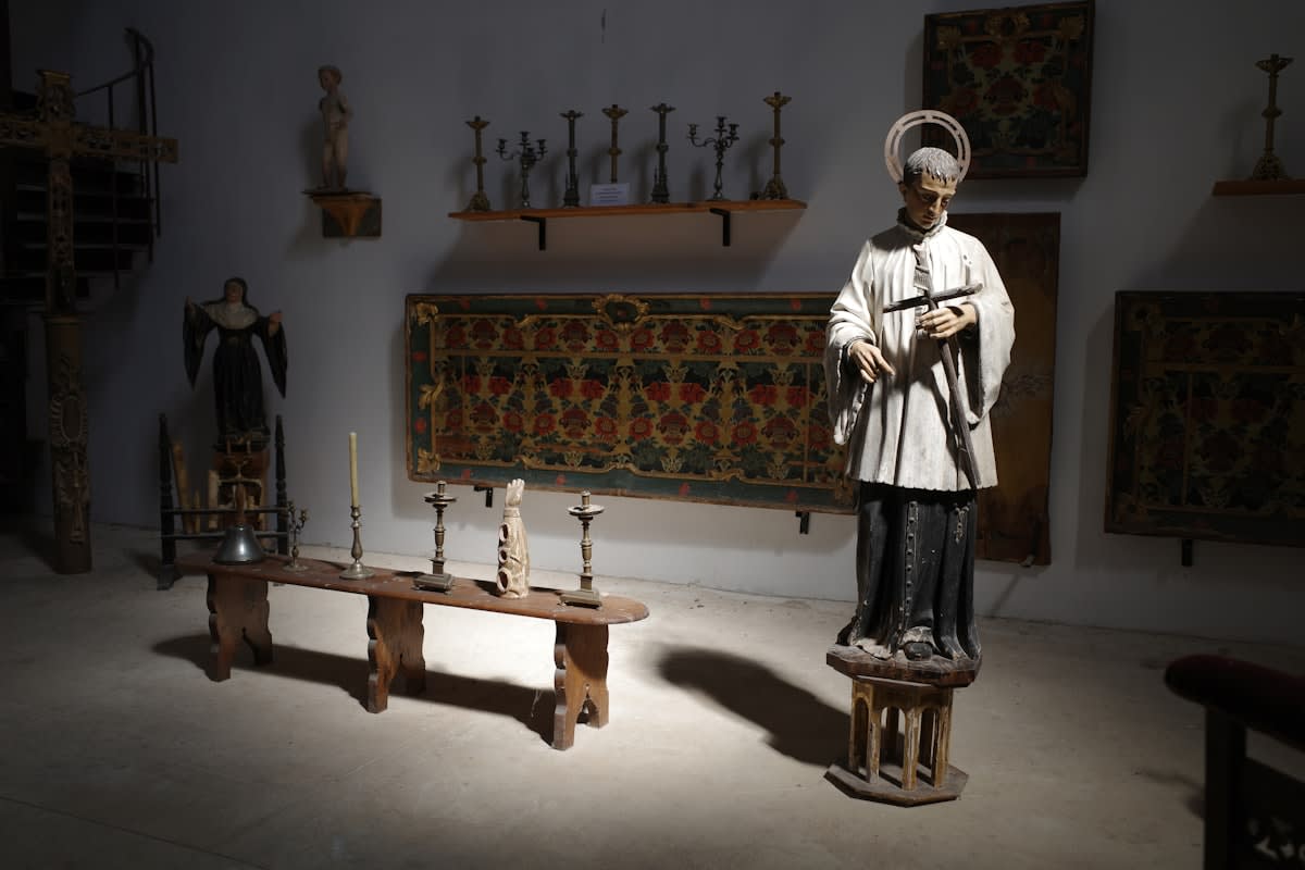 Ancient Benin Bronzes in a museum setting