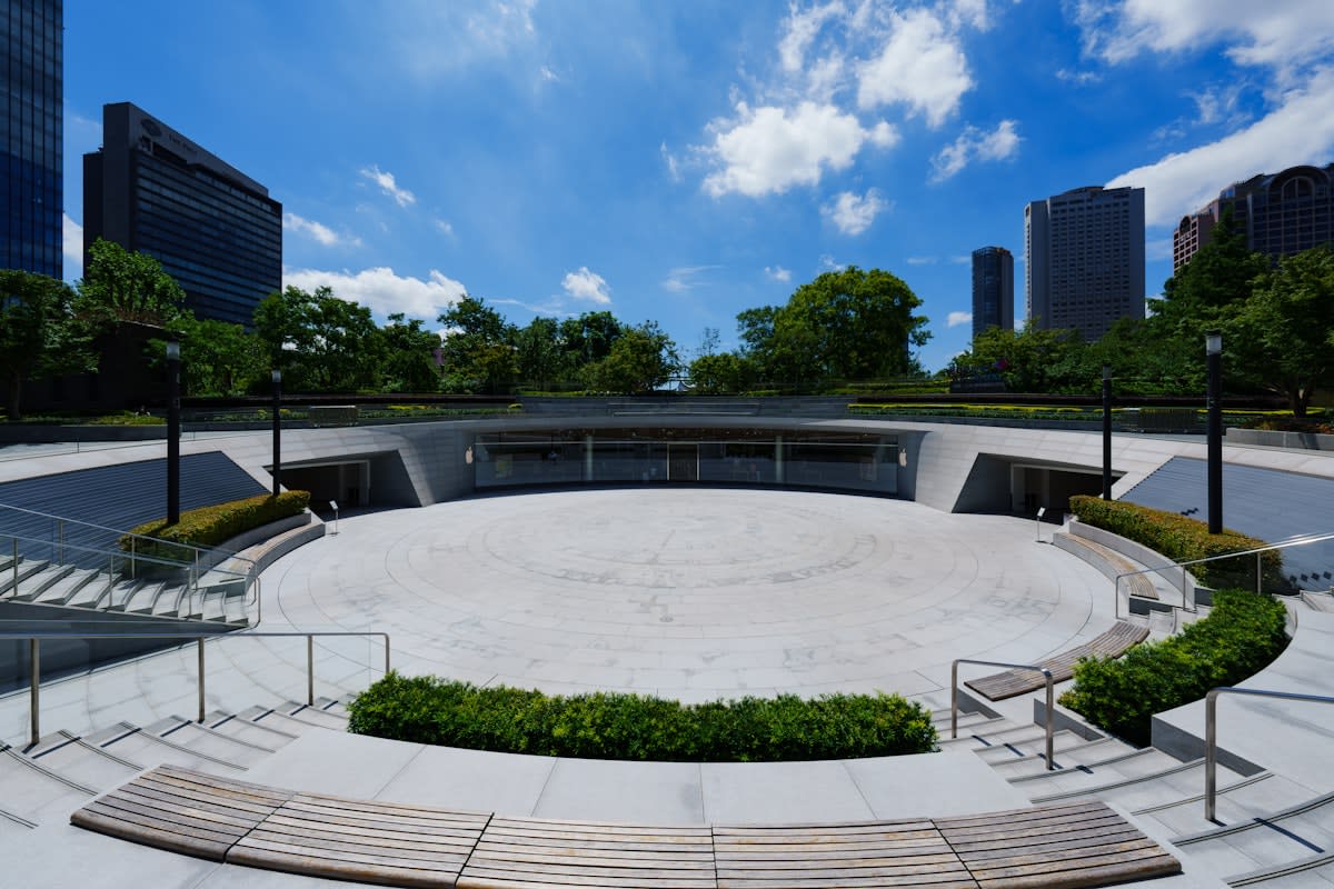 Empty modern urban plaza with concrete benches