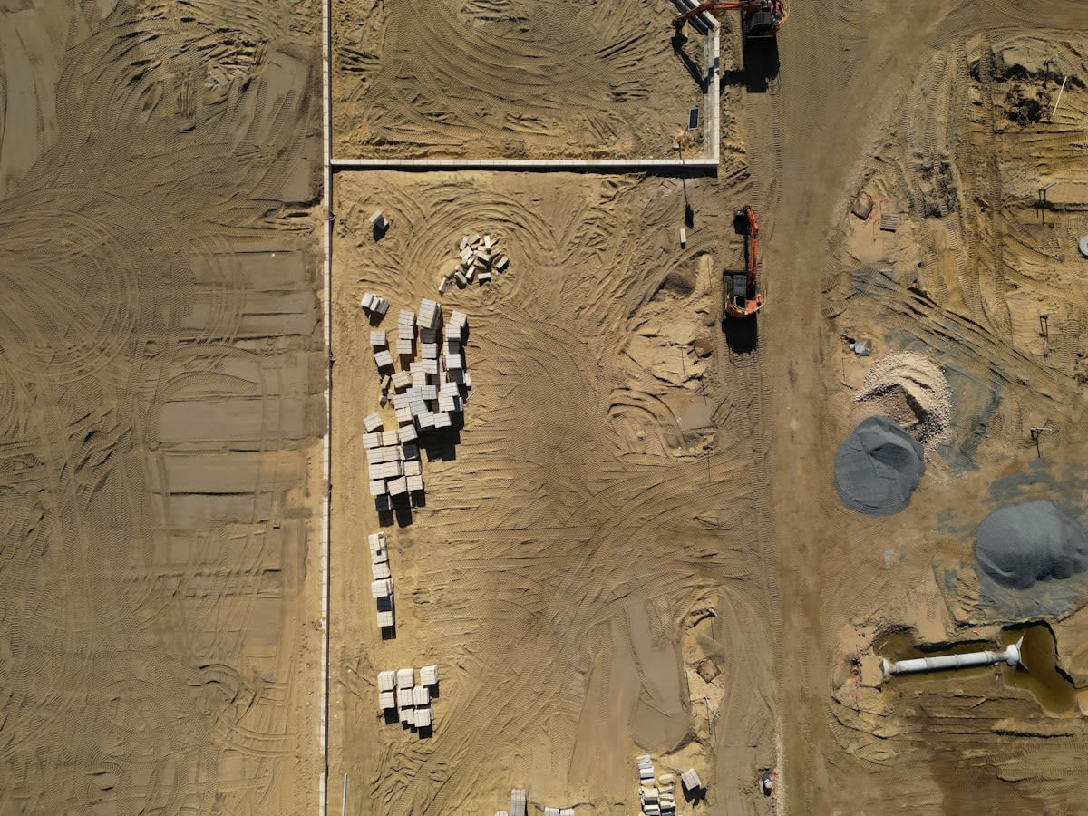 Aerial view of a massive, unfinished infrastructure project