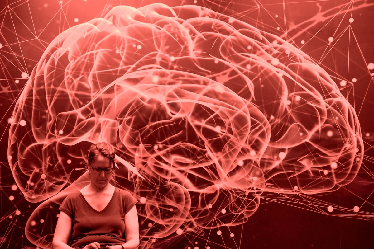 Digital representation of a neural network overlapping a human brain