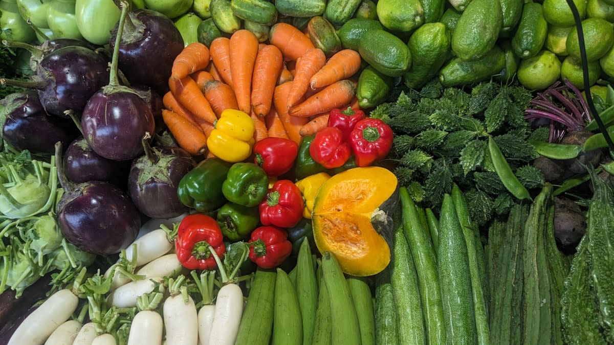 Close up of diverse colorful vegetables and seeds