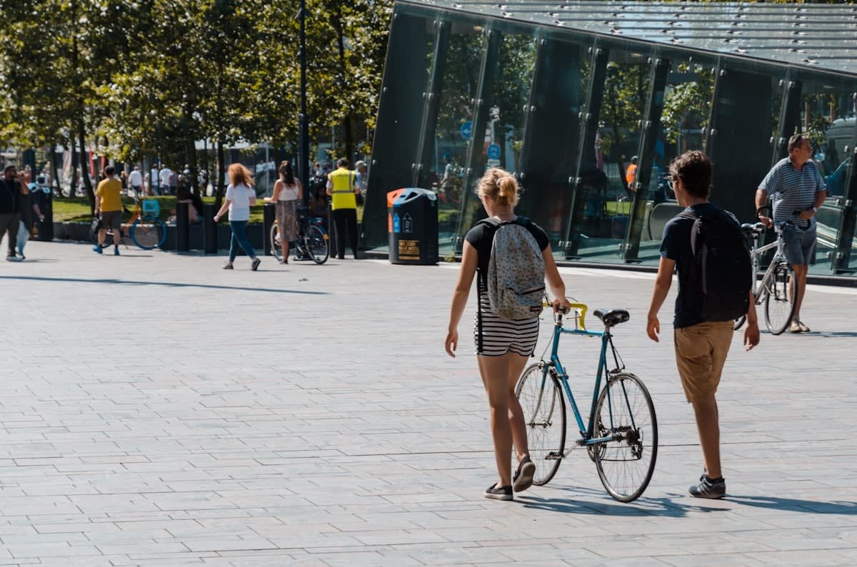 Pedestrians in a vibrant city square