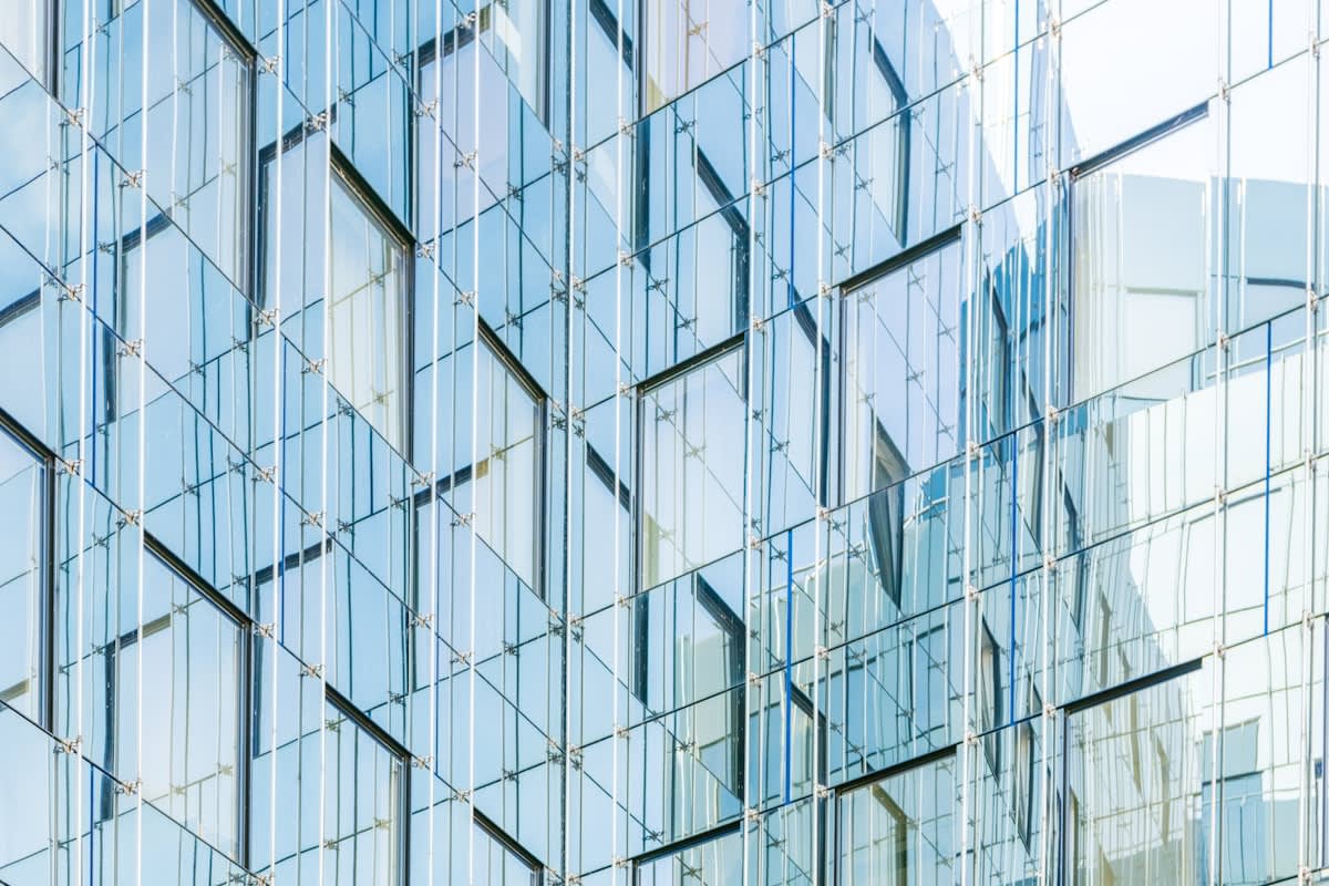 Modern architectural skyline reflecting in glass