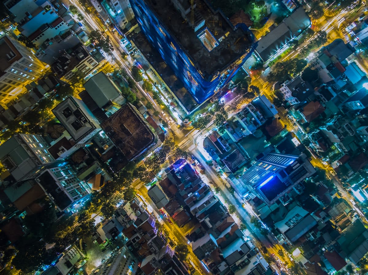 Aerial view of a grid-based city with heavy traffic