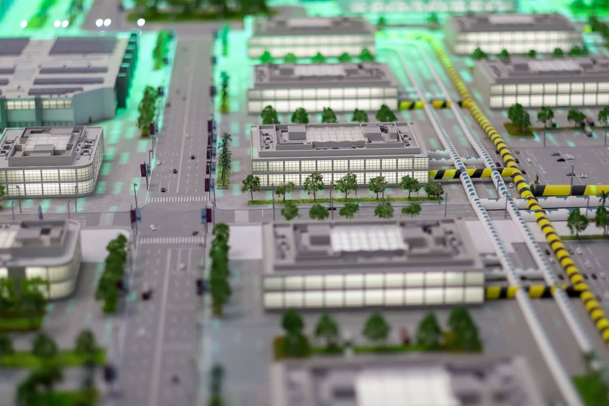 Modern distributed city architecture with green spaces