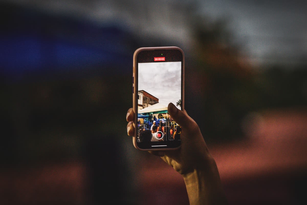 Smartphone displaying a vertical video feed