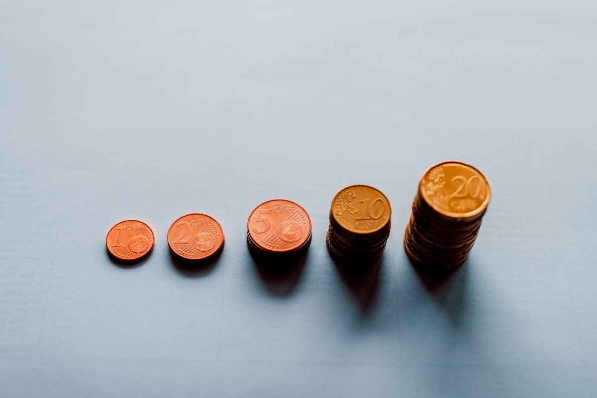 Financial growth concept with coins and charts