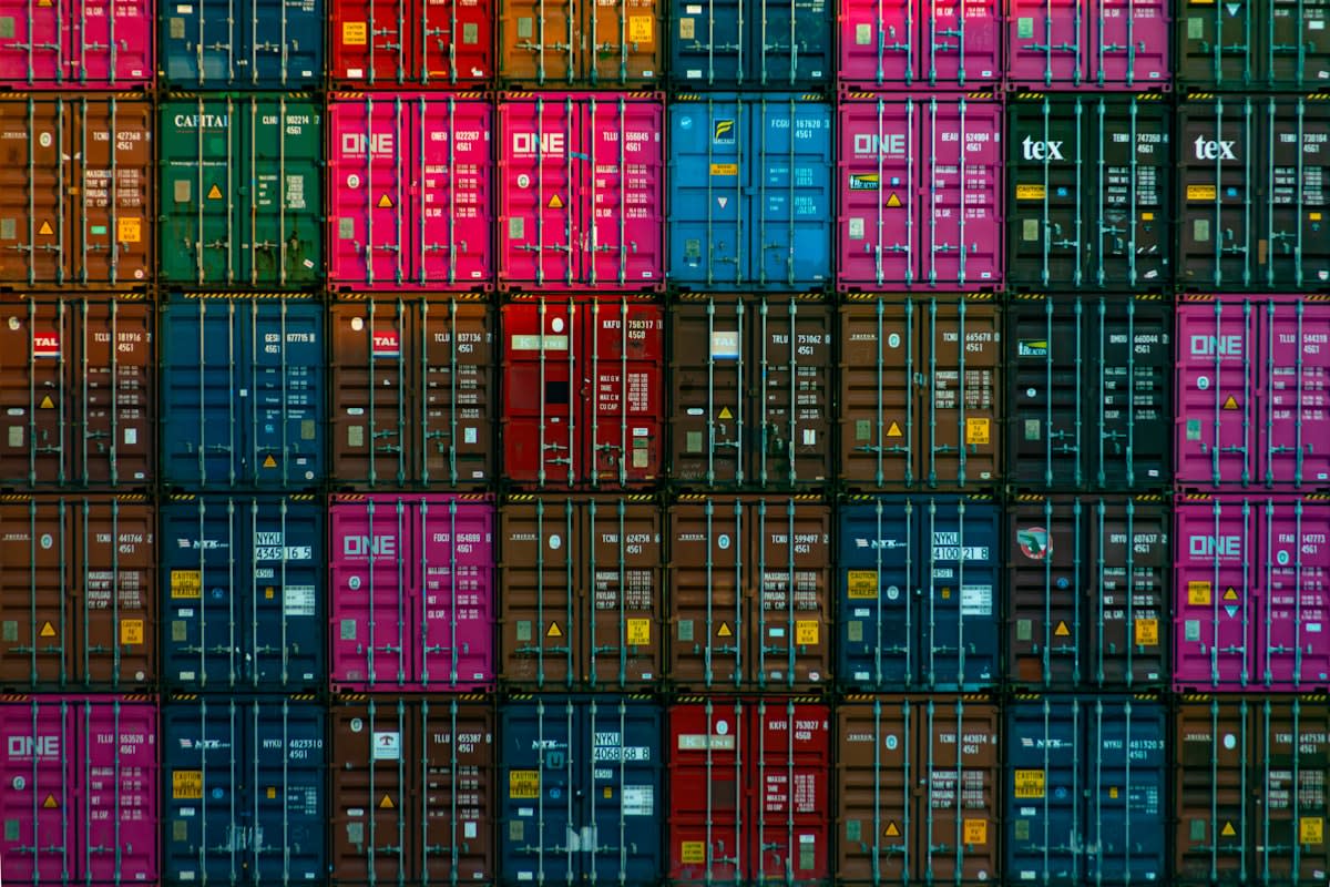 Aerial view of a modern shipping port with colorful containers