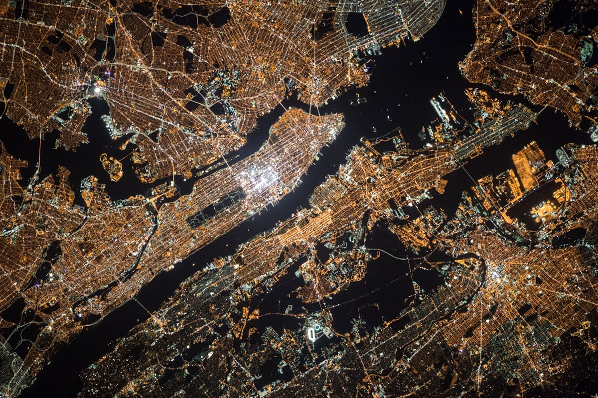 Aerial view of a global metropolis with intersecting transit lines