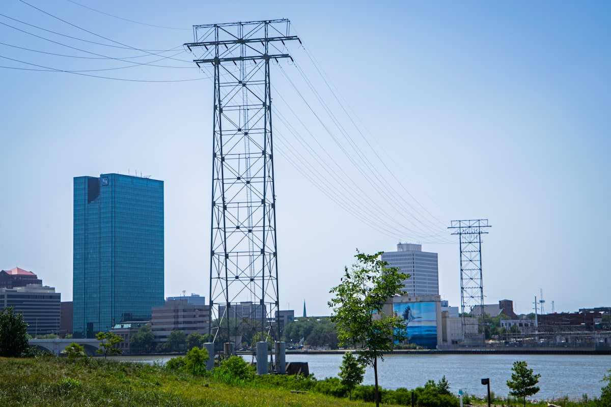 Modern urban skyline with energy infrastructure