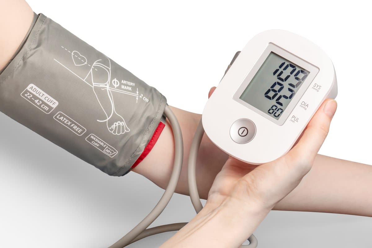medical glucose monitor on arm