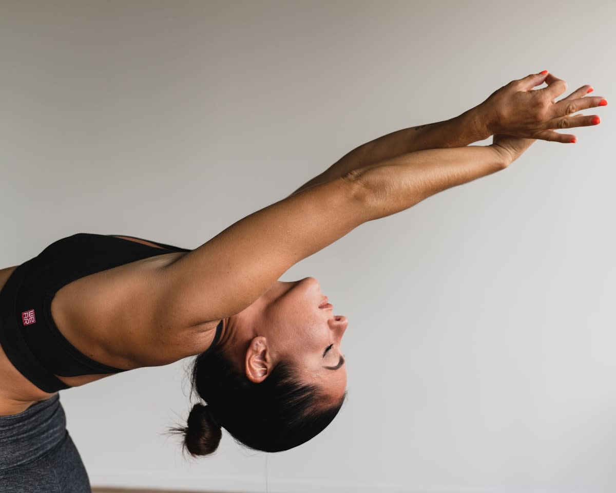 Person practicing yoga or pilates