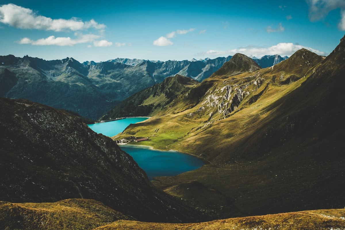 Aerial view of mountains and a quiet lake