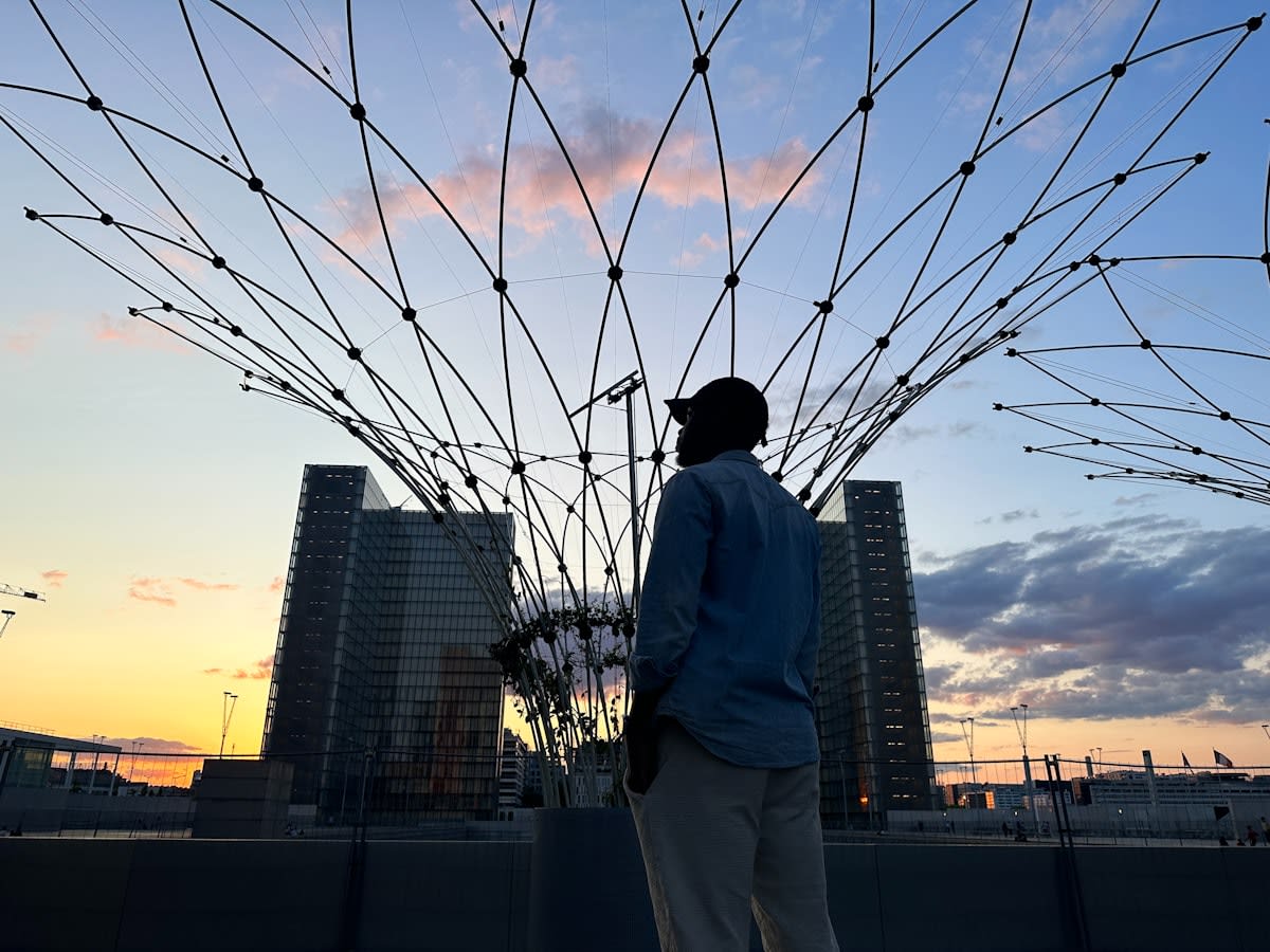 person looking at complex digital network of connected nodes