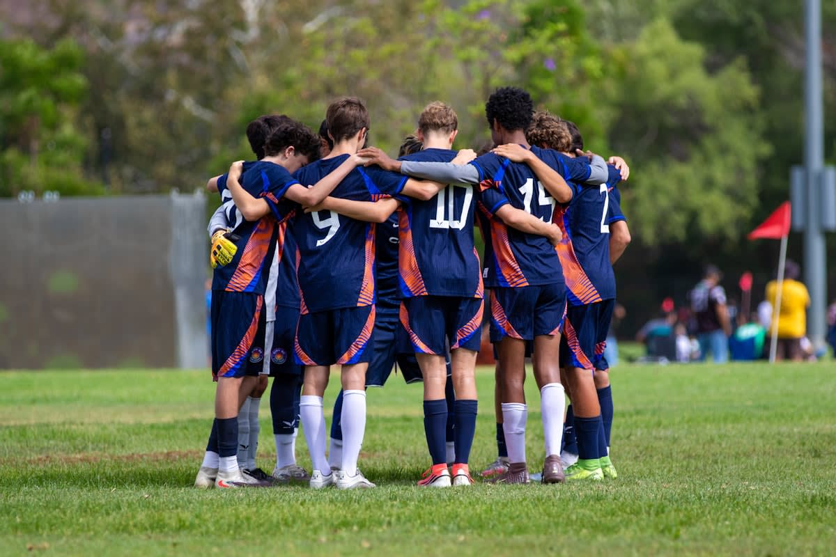 Athletes in a huddle
