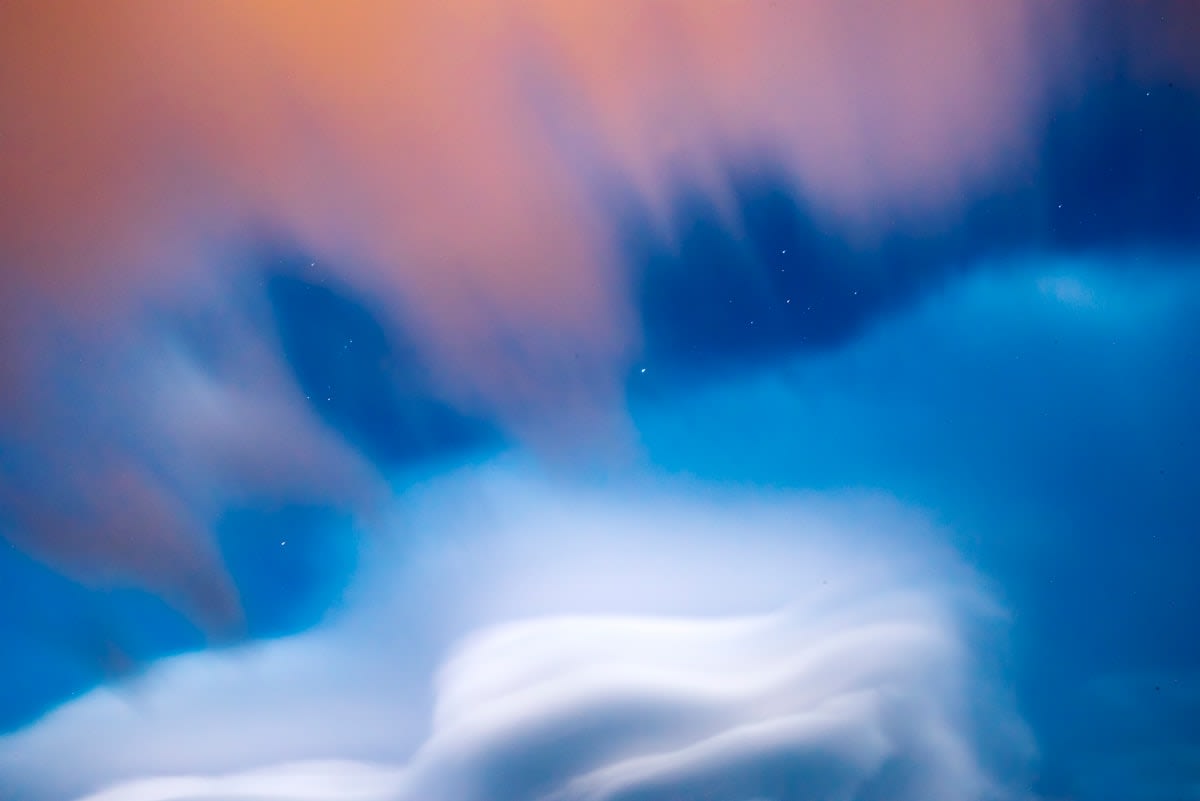 Abstract representation of sound waves and dreamlike clouds