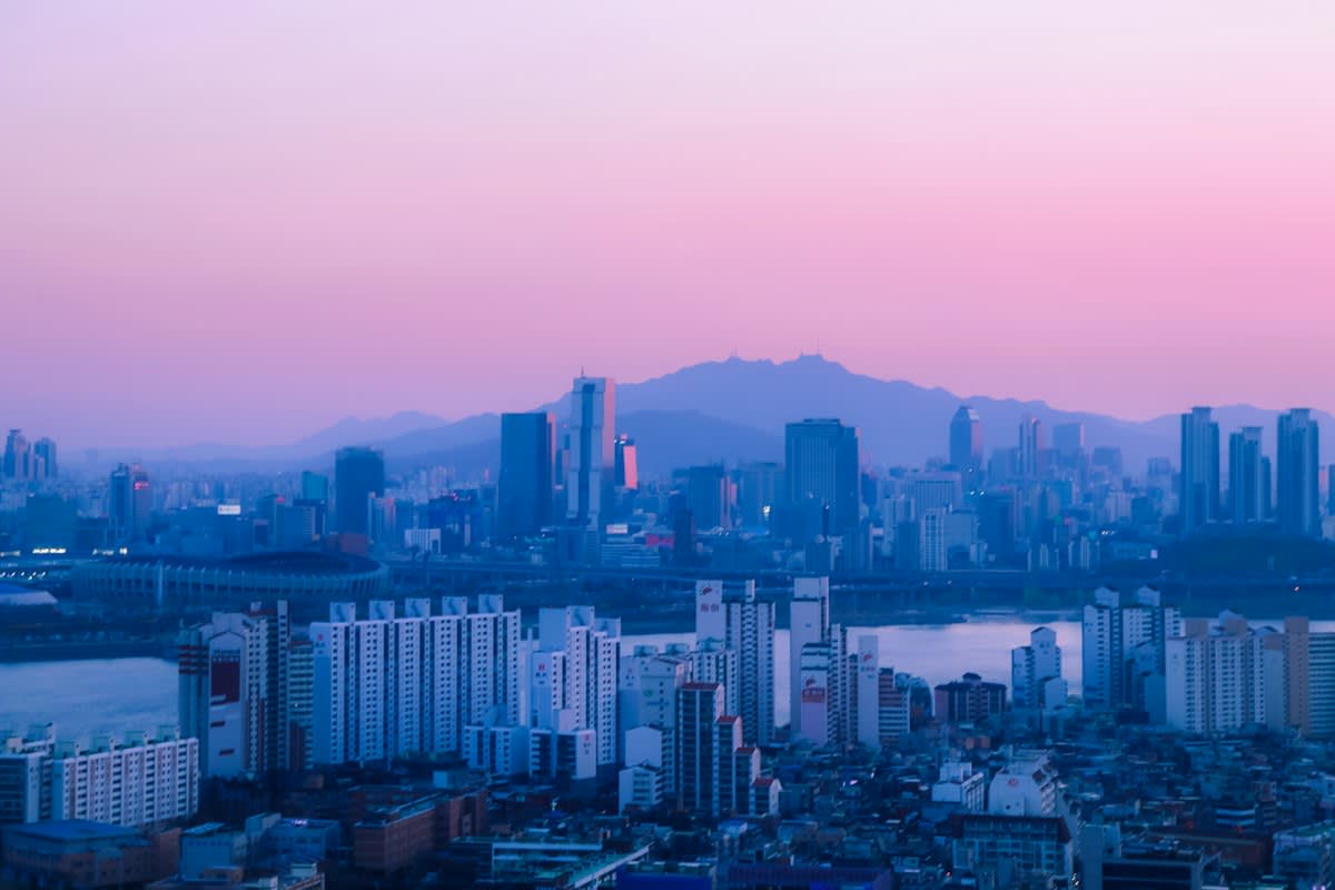 Seoul city skyline at night with neon lights