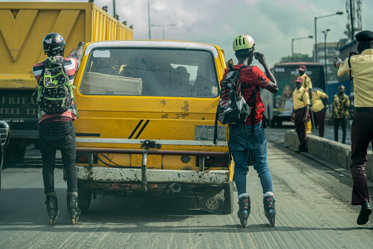 Busy Lagos street with technology hubs