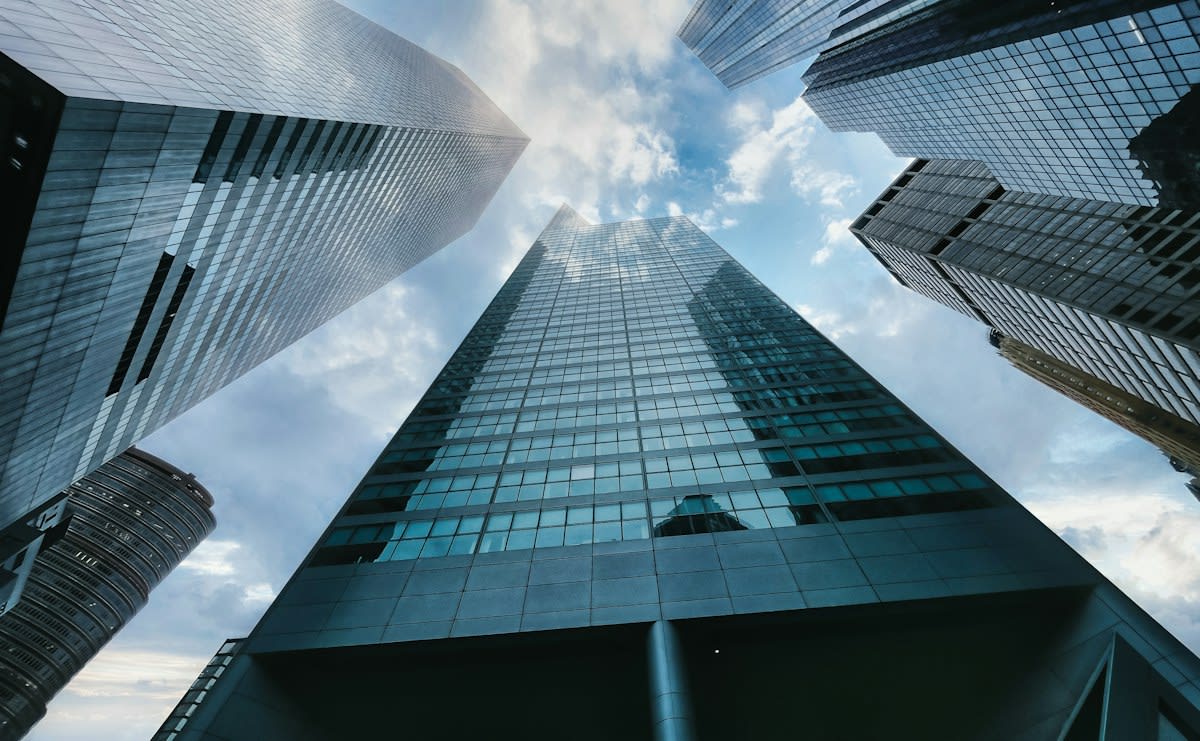 Modern architectural skyscraper representing real estate assets