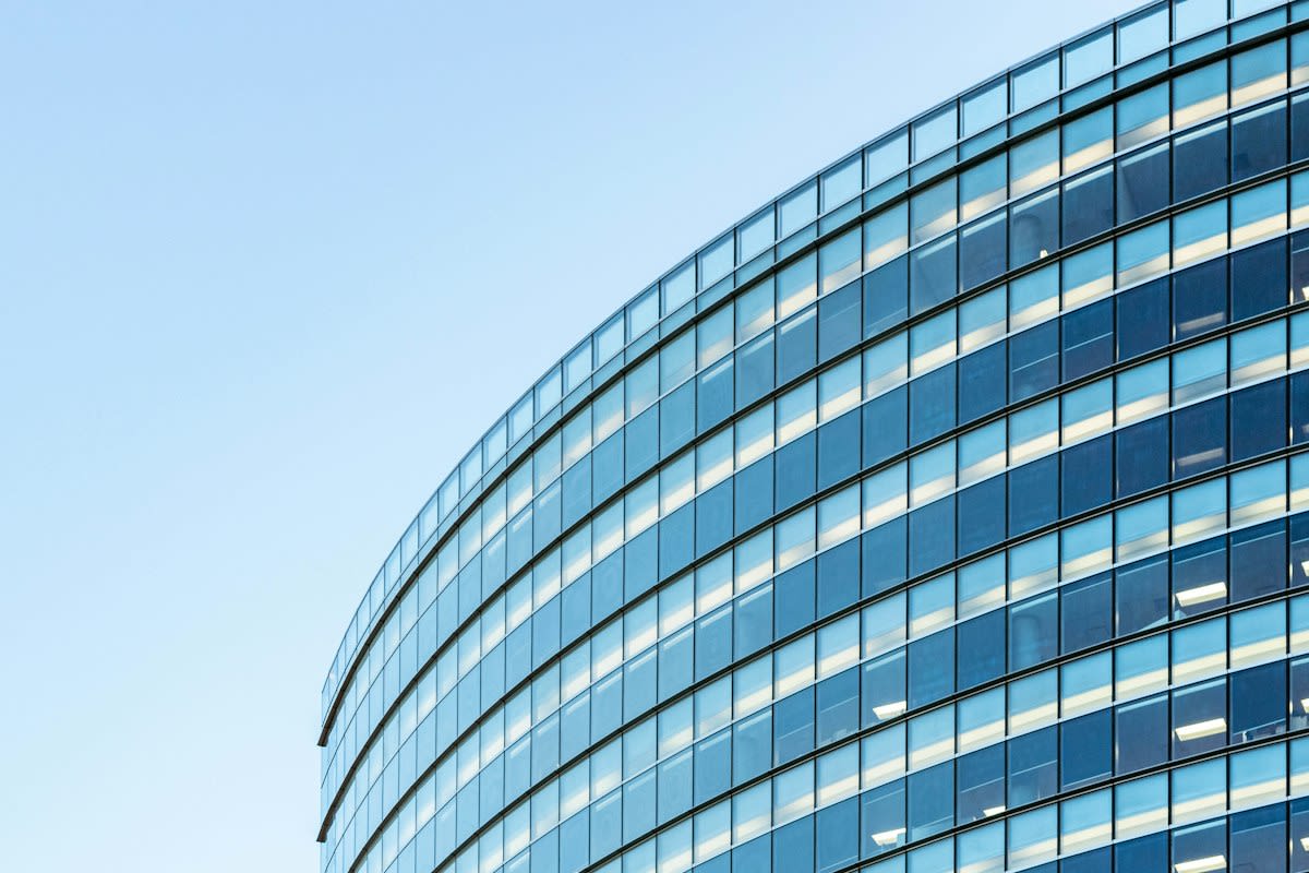 Modern glass skyscraper office building