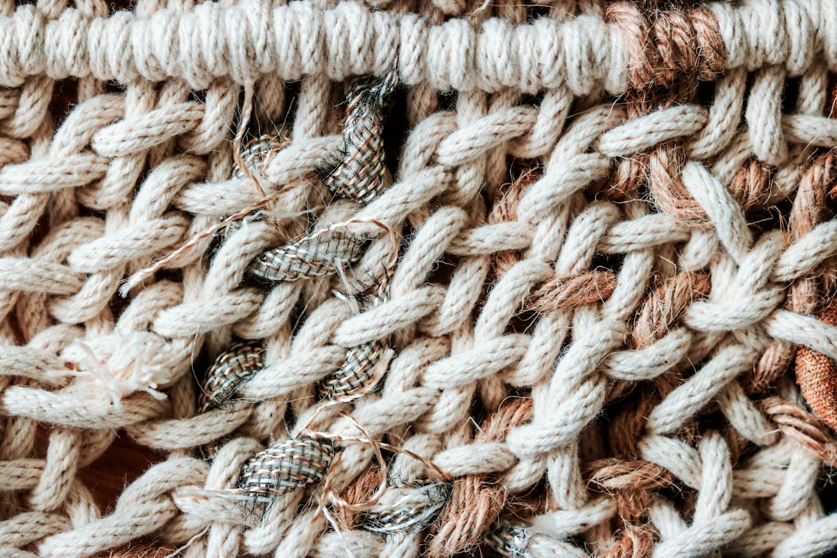 Close up of intricate knotted textiles