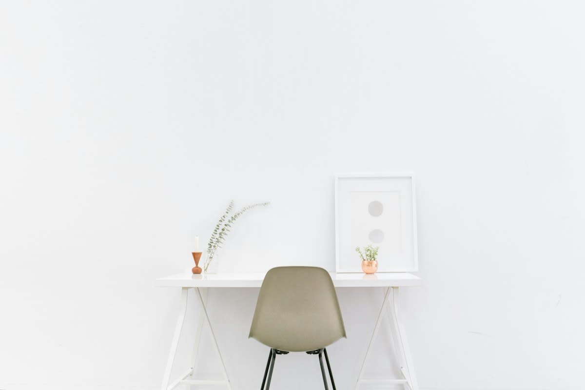 Minimalist workspace with single lamp