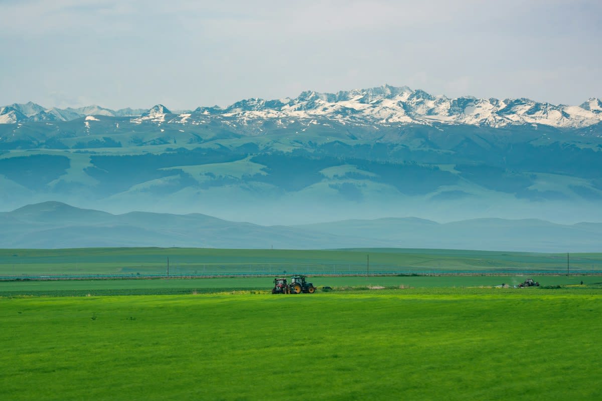autonomous tractor in a vast field